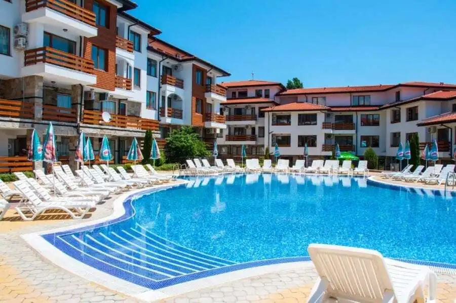 Modern apartment complex with swimming pool at Gardenia Hills, Sunny Beach.