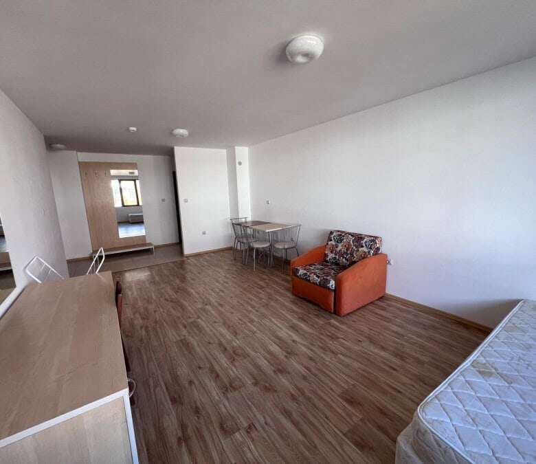 Apartment interior with living area and bedroom in Gardenia Hills, near Sunny Beach.