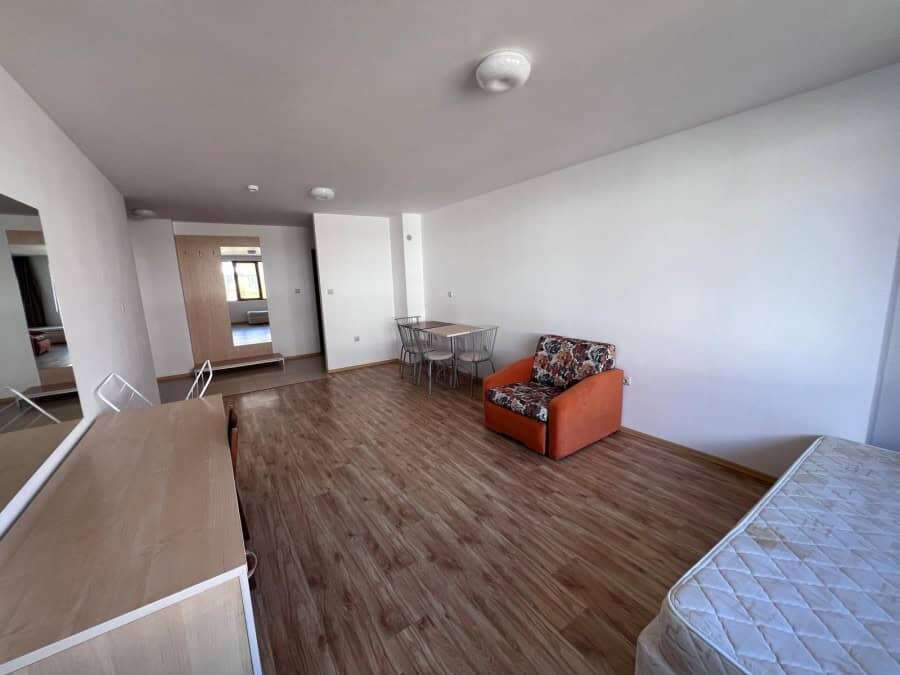 Apartment interior with living area and bedroom in Gardenia Hills, near Sunny Beach.