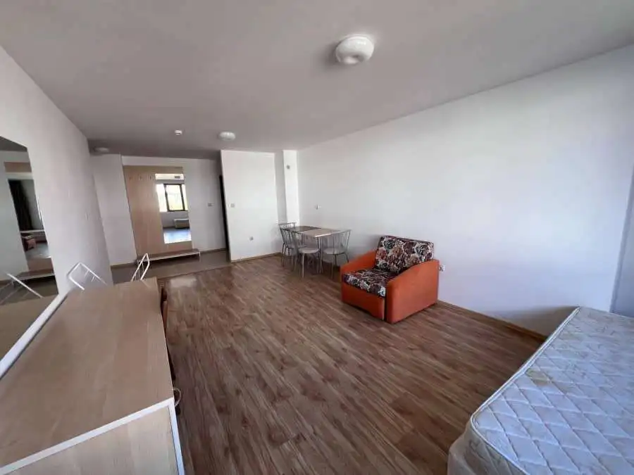Apartment interior with living area and bedroom in Gardenia Hills, near Sunny Beach.