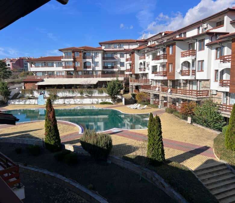 Spacious 1-bedroom apartment in Gardenia Hills near Sunny Beach, featuring a shared pool and lush la.