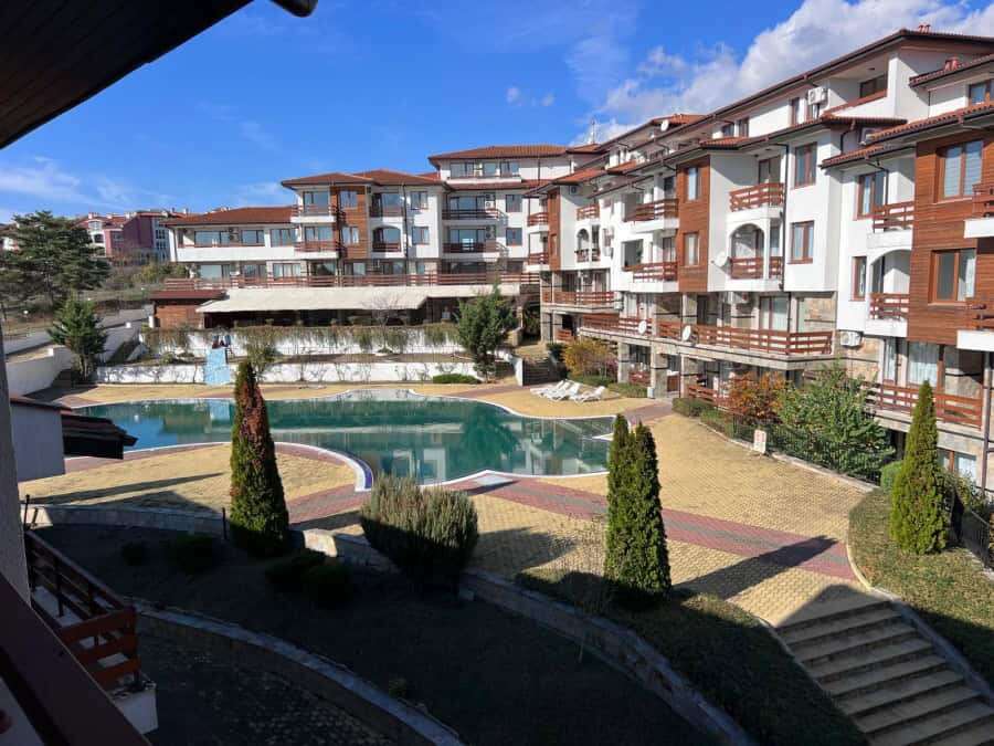 Spacious 1-bedroom apartment in Gardenia Hills near Sunny Beach, featuring a shared pool and lush la.