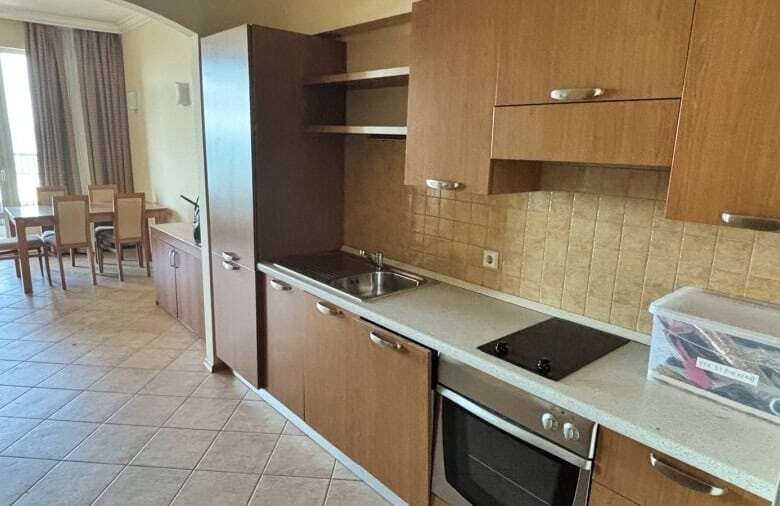 Interior view of a modern kitchen in a beachfront Sunset Resort apartment, Pomorie.