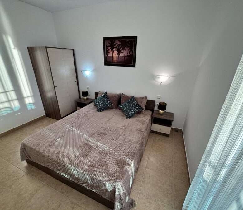 Sea view bedroom with modern decor and natural light in Costa Calma, Ravda.