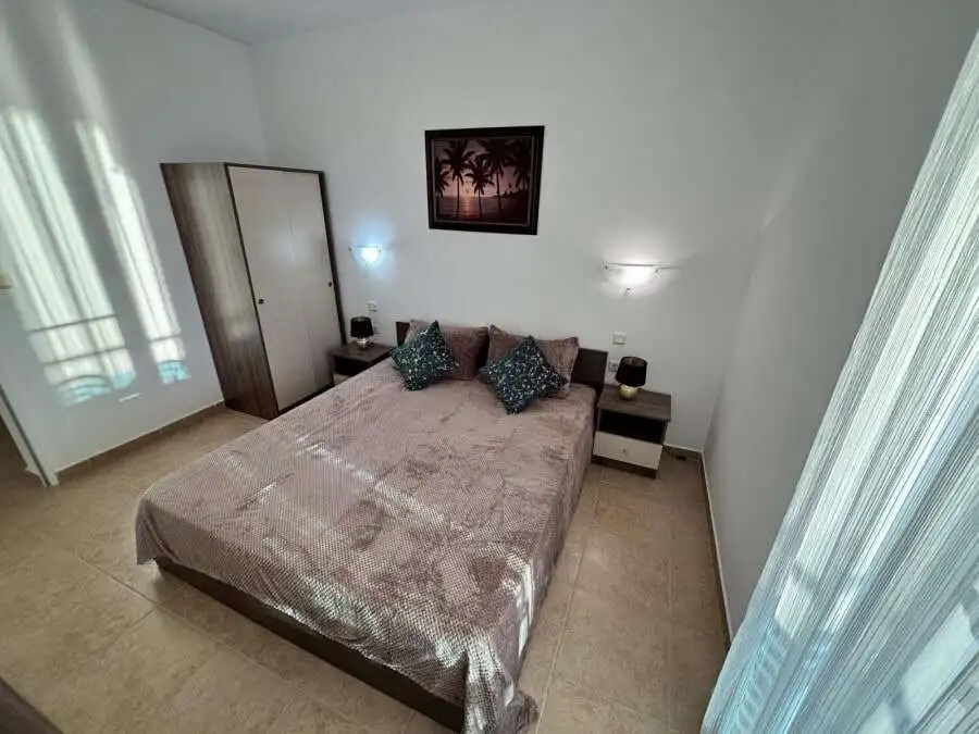 Sea view bedroom with modern decor and natural light in Costa Calma, Ravda.
