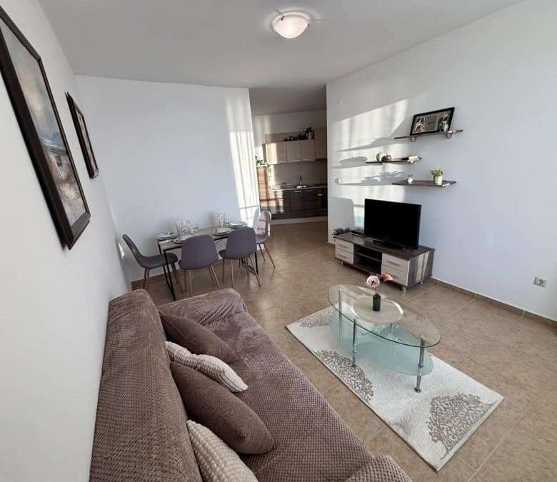 Bright living room with sea views and modern furnishings.