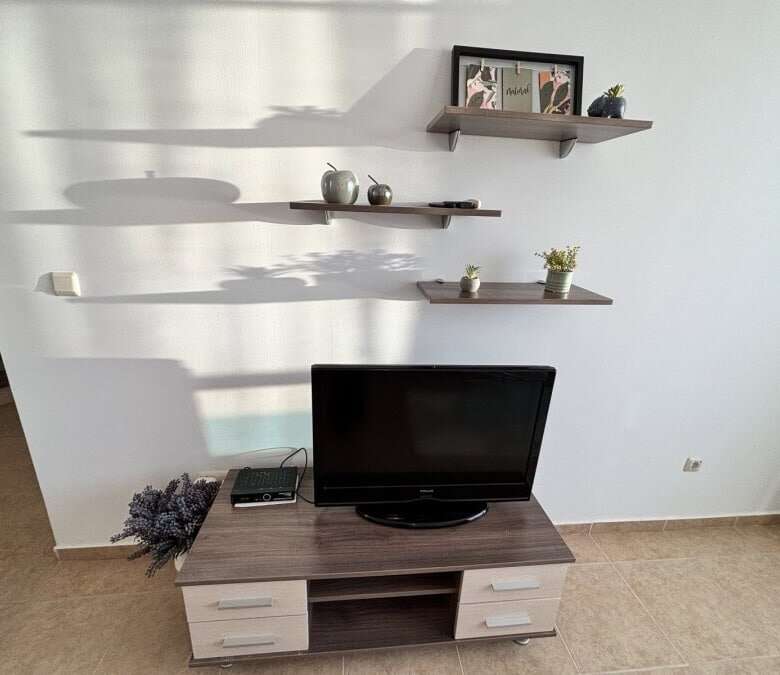 Sea view 1-bedroom apartment in Costa Calma, Ravda, with modern interior and balcony.
