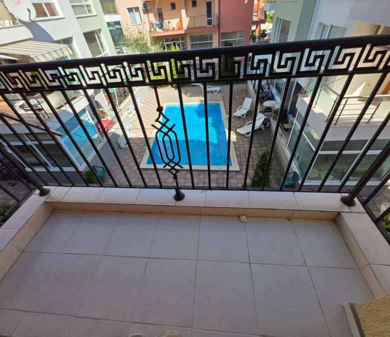 Balcony view of pool and surrounding apartments near Aurealia beach, Nessebar.