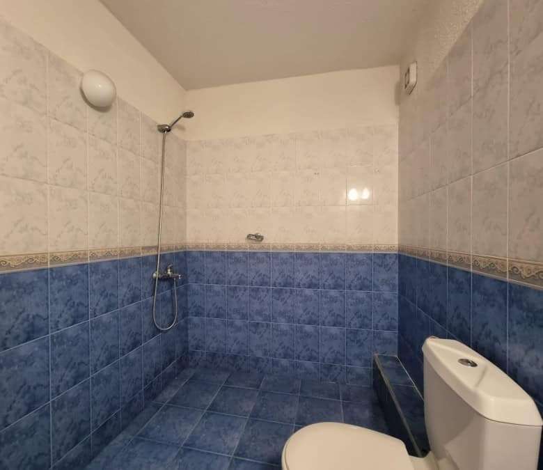 Bright bathroom with shower and toilet in Prima 1, Sunny Beach.