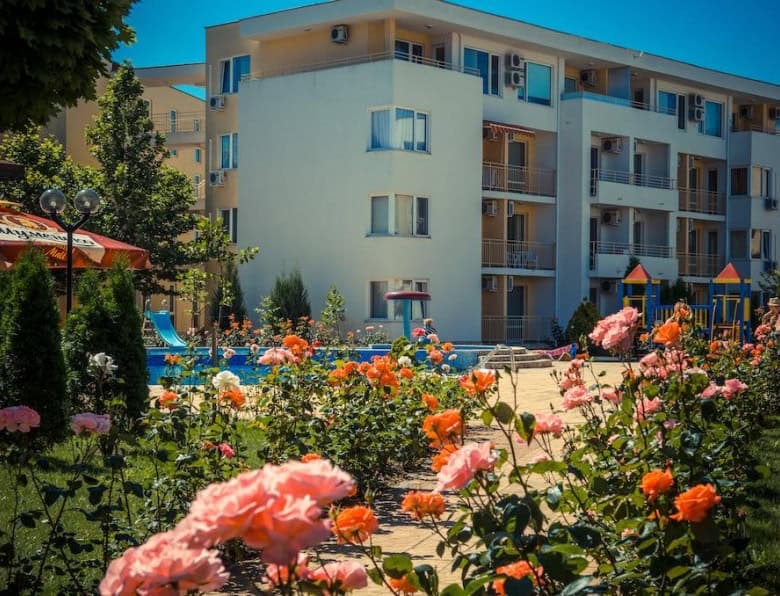 Apartment building in Nessebar Fort club, Sunny Beach with garden and pool views.