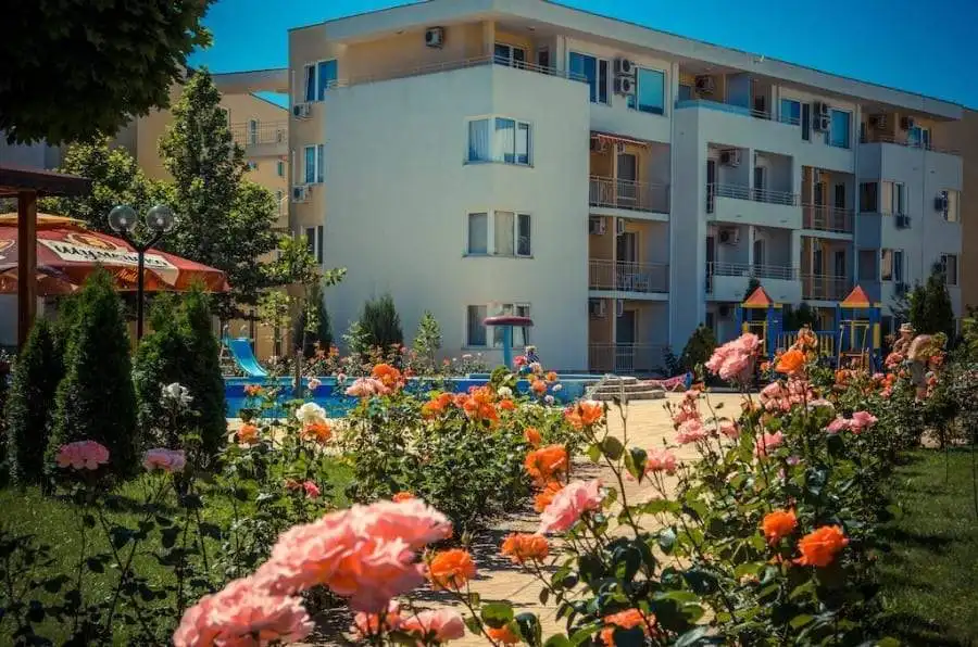 Apartment building in Nessebar Fort club, Sunny Beach with garden and pool views.