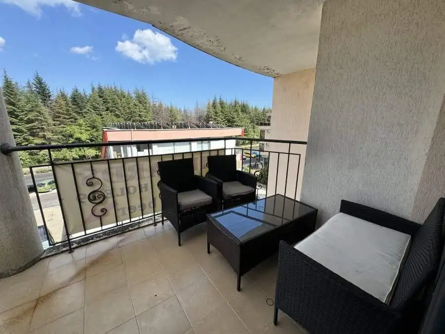 Balcony view of Avalon Sunny Beach with outdoor seating area.