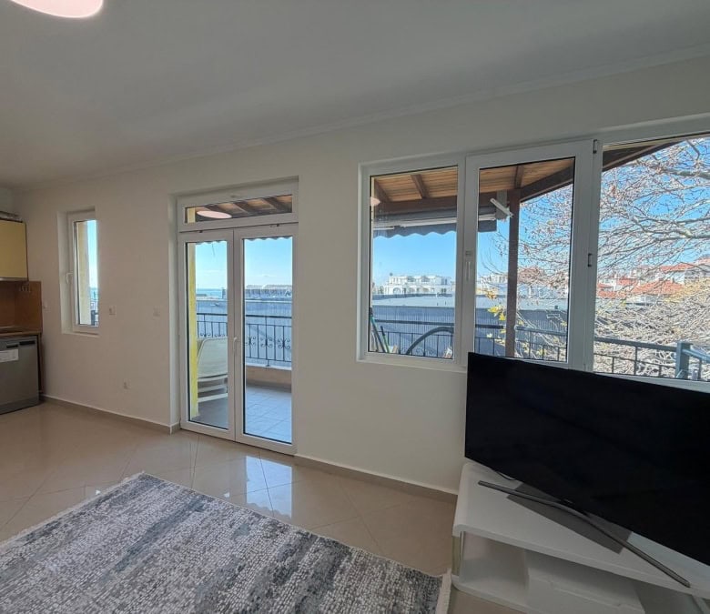 Sea view 1-bedroom apartment in Sveti Vlas with balcony and modern interior.