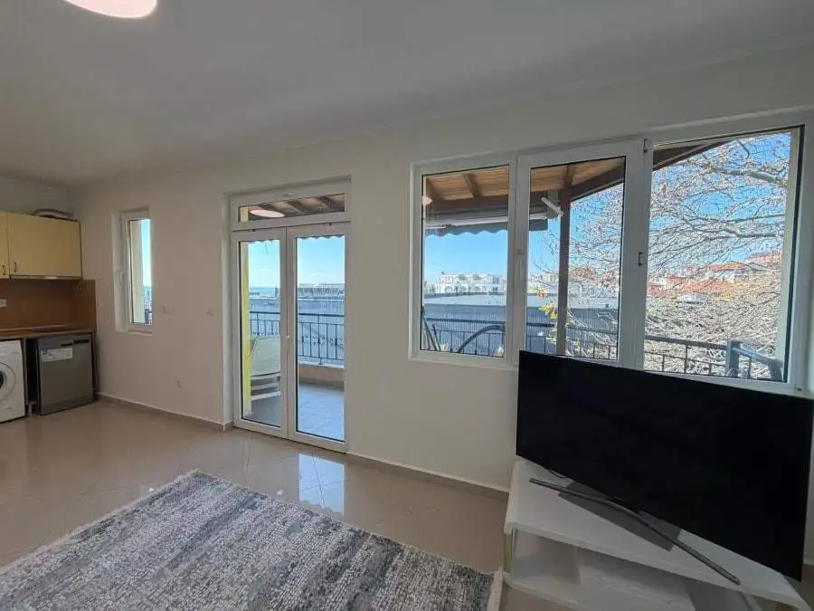 Sea view 1-bedroom apartment in Sveti Vlas with balcony and modern interior.