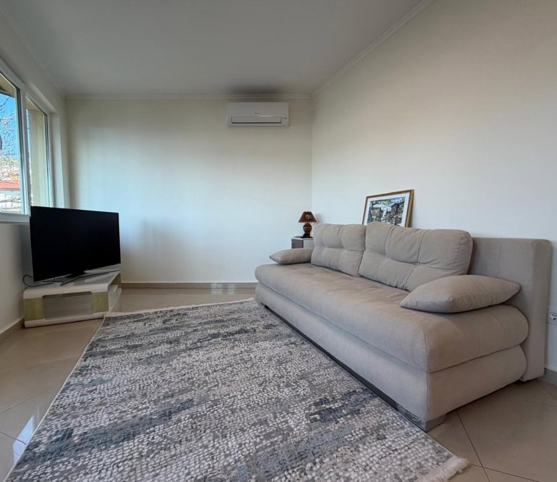 Bright living room with sea view and modern decor in Sveti Vlas.