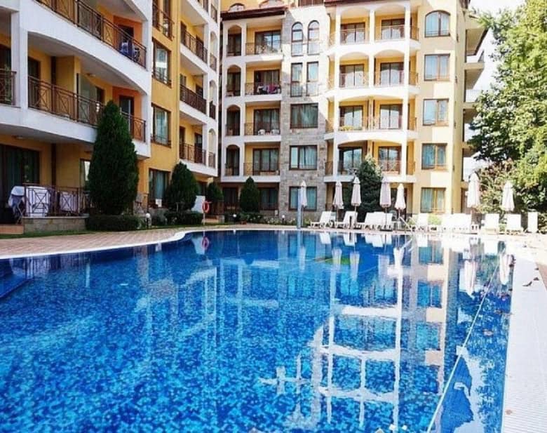 Pool view of an elegant apartment complex in Sunny Beach, Bulgaria.