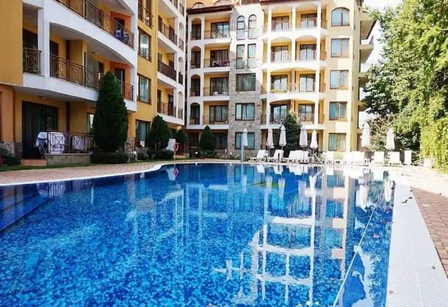 Pool view of an elegant apartment complex in Sunny Beach, Bulgaria.