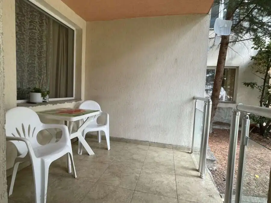 Balcony with outdoor seating in a fully furnished 1-bedroom apartment in Vista Residence, Sveti Vlas.