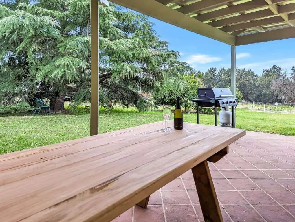 Vineyard Estate with 2 Homes for Sale in Broke Vineyard estate featuring a spacious outdoor patio with a BBQ grill and scenic views in Broke.