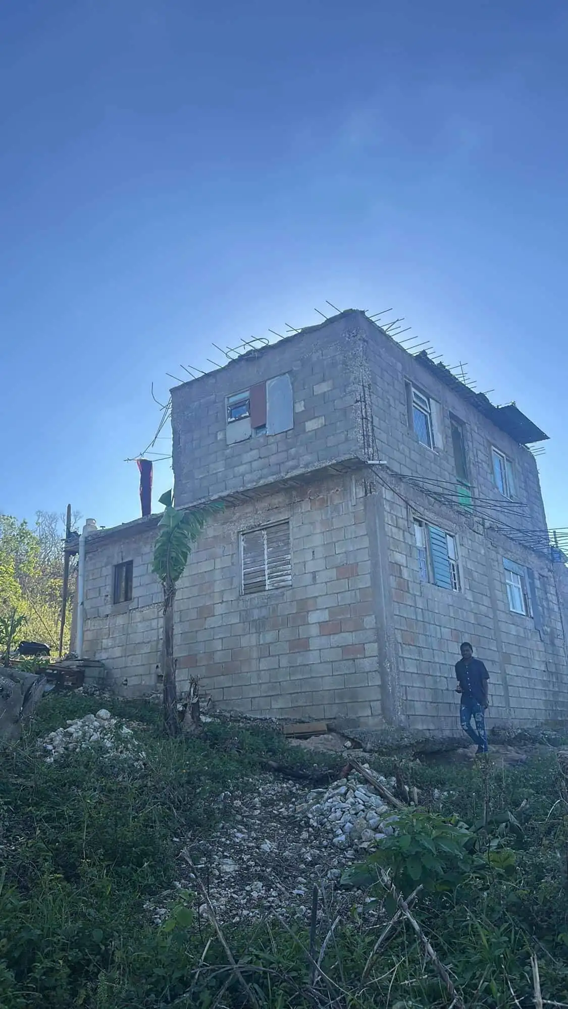 Unfinished multi-story building on a 1-acre plot in Rose Hall Estate, Montego Bay.