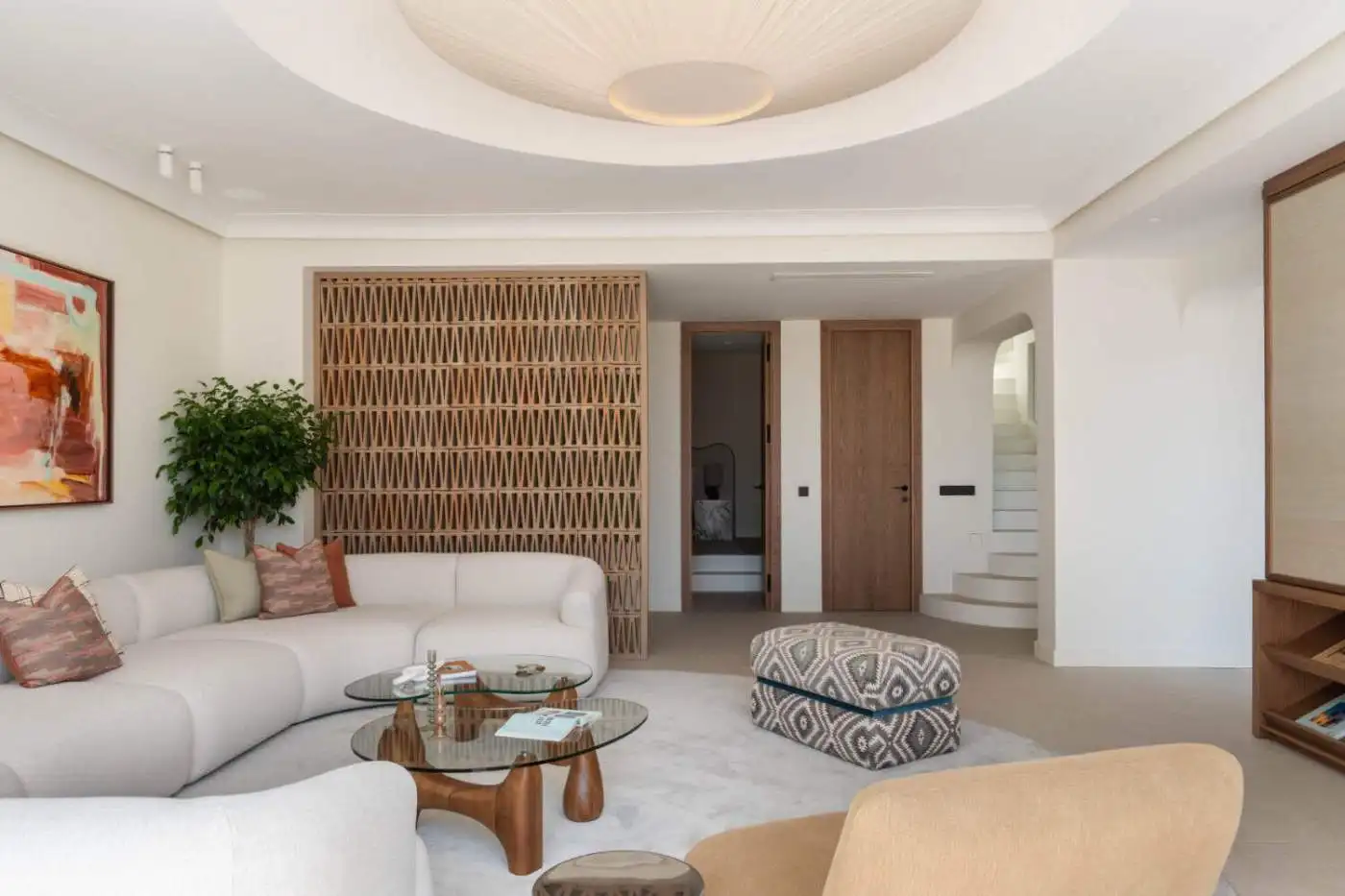 Elegant beachfront semi-detached home in Marbella's Golden Mile with modern interiors.