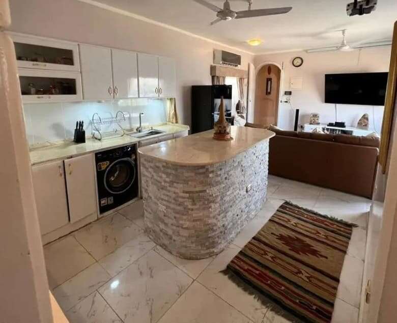 Modern kitchen with island in Derrymore Glen estate, County Clare.