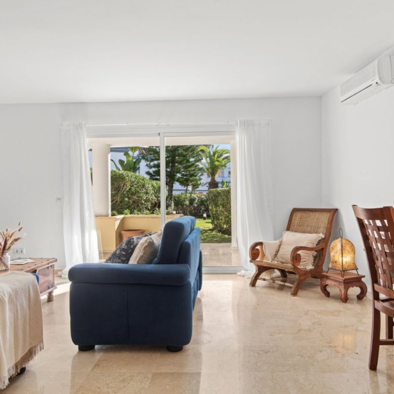 Beachfront living room with ocean views and elegant furniture in Dominion Beach.