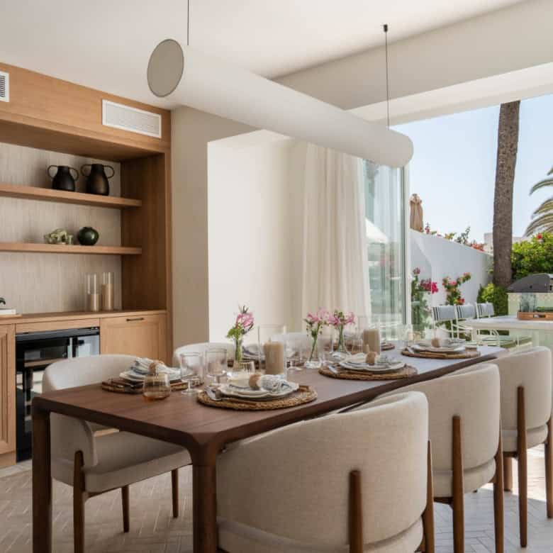 Beachfront semi-detached home with stylish interior and outdoor terrace in Marbella Golden Mile.