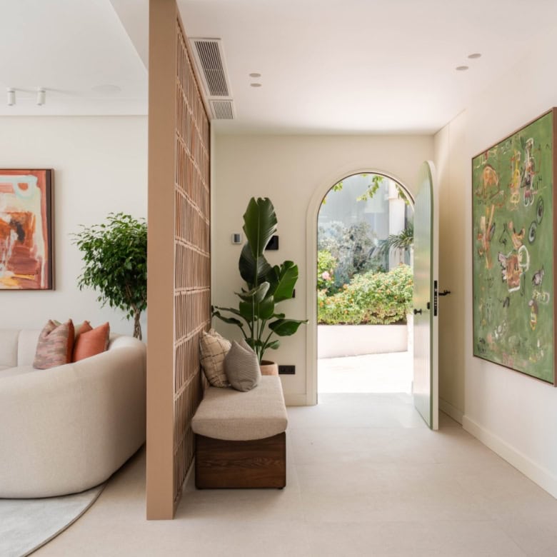 Elegant beachfront semi-detached home in Marbella Golden Mile with contemporary design.