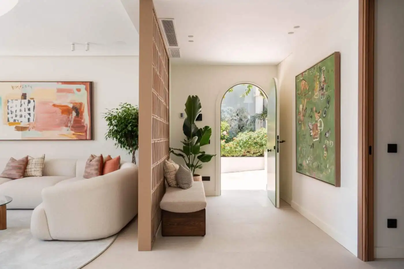 Elegant beachfront semi-detached home in Marbella Golden Mile with contemporary design.
