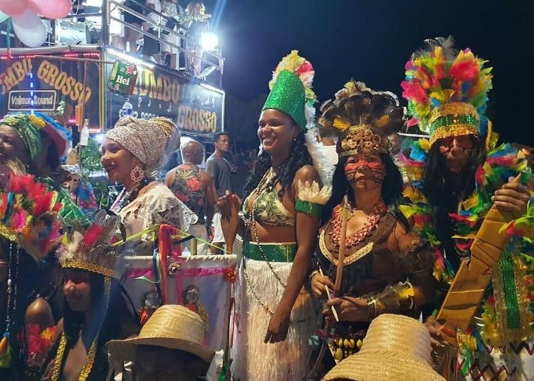 Vibrant Bahia festival with performers in elaborate costumes celebrating local culture.