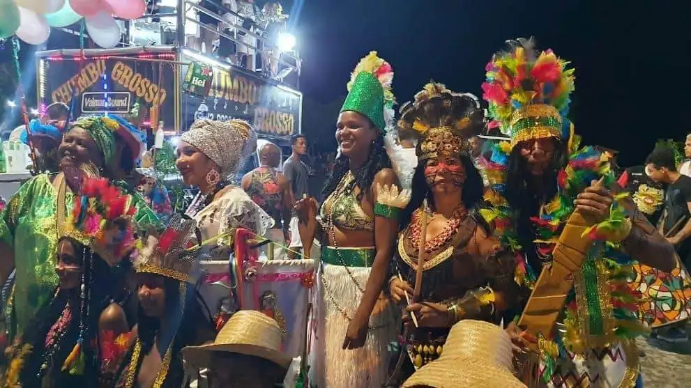Vibrant Bahia festival with performers in elaborate costumes celebrating local culture.