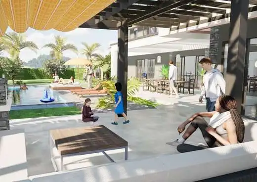 Luxury resort pool with children playing and relaxing guests.