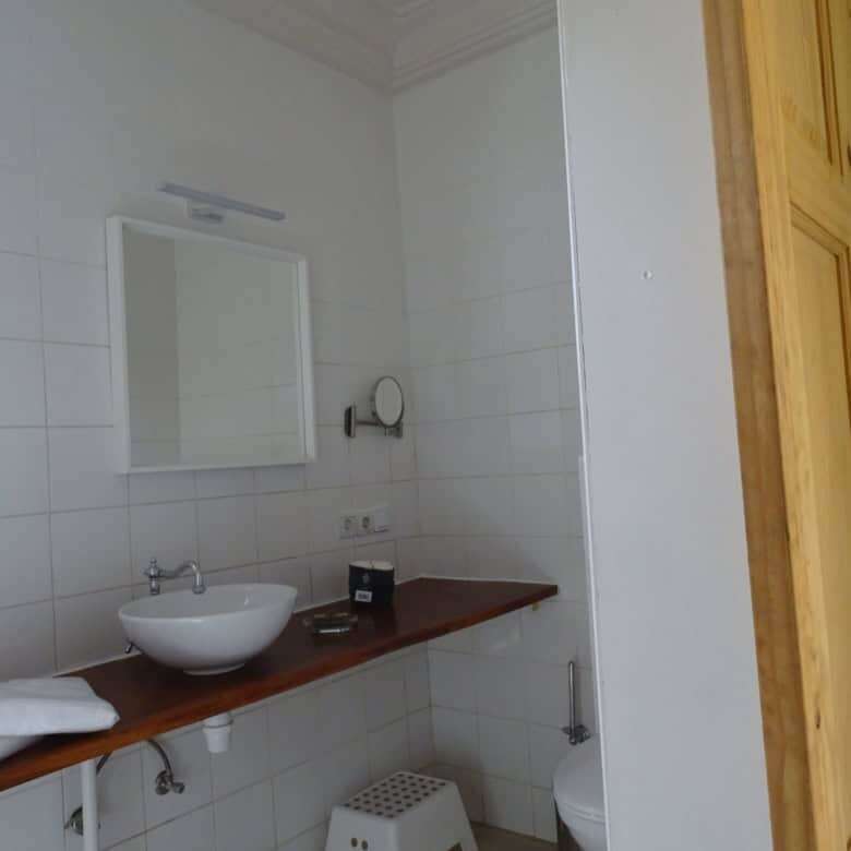 Cozy bathroom with modern fixtures in a bed and breakfast property for sale.
