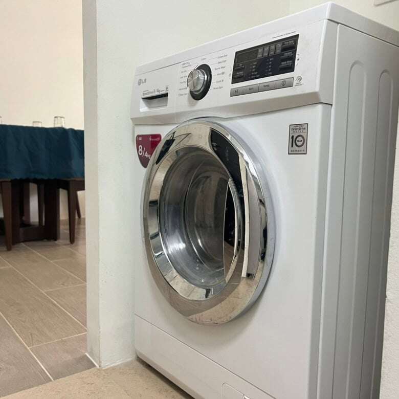 Washing machine in a contemporary Boracay apartment, ideal for modern living and convenient laundry.