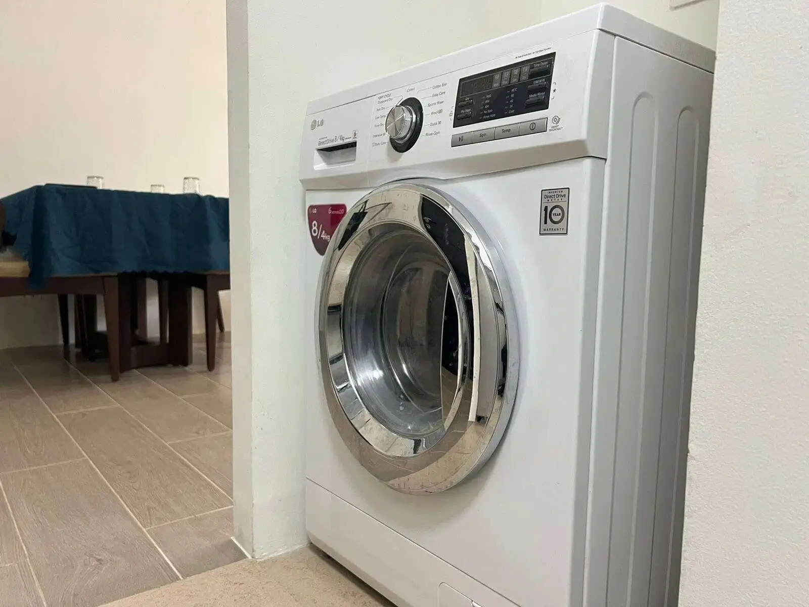 Washing machine in a contemporary Boracay apartment, ideal for modern living and convenient laundry.