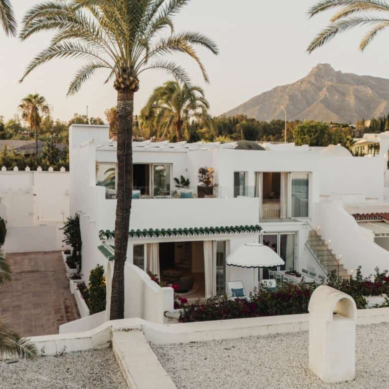 Elegant semi-detached property on Marbella's Golden Mile with direct beach access.