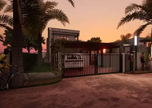 RH Palmeraie Resort entrance gate with sunset sky in Ngaparou Saly.