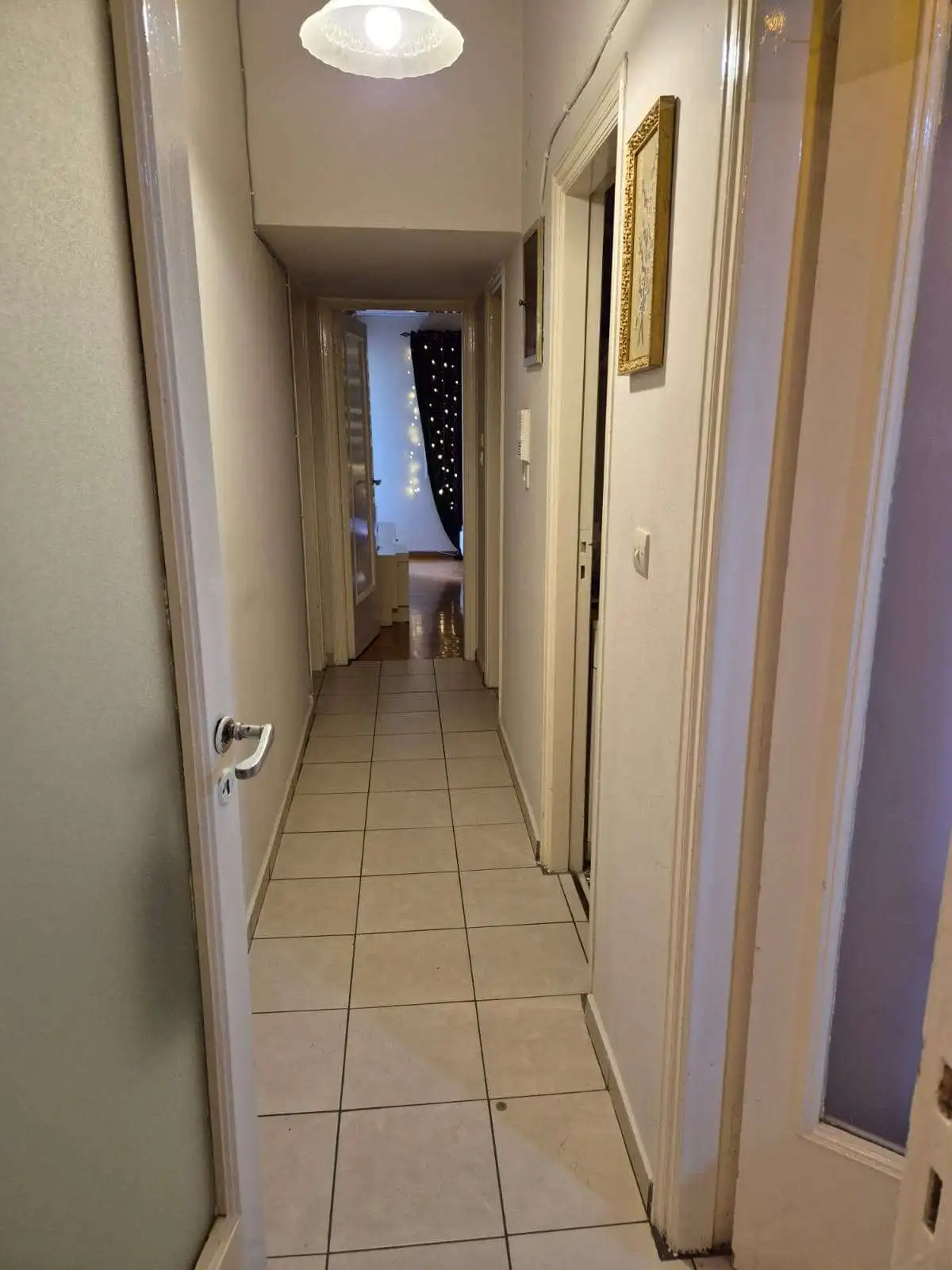 Spacious 3-bedroom apartment for sale in Kypseli, Athens, featuring balconies and a bright, welcomin.