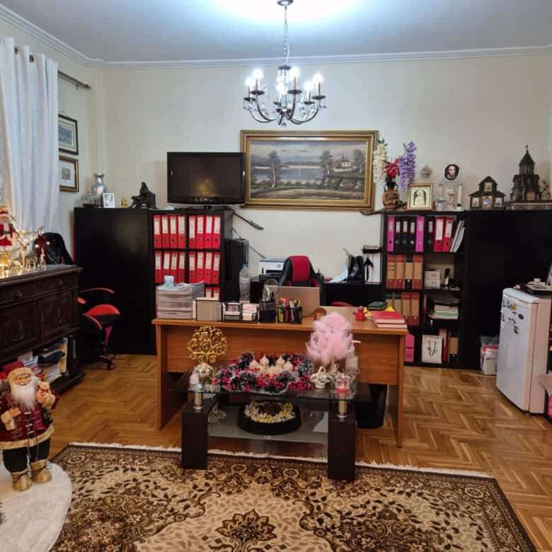 Bright apartment for sale in Kypseli, Athens featuring spacious rooms and charming balconies.