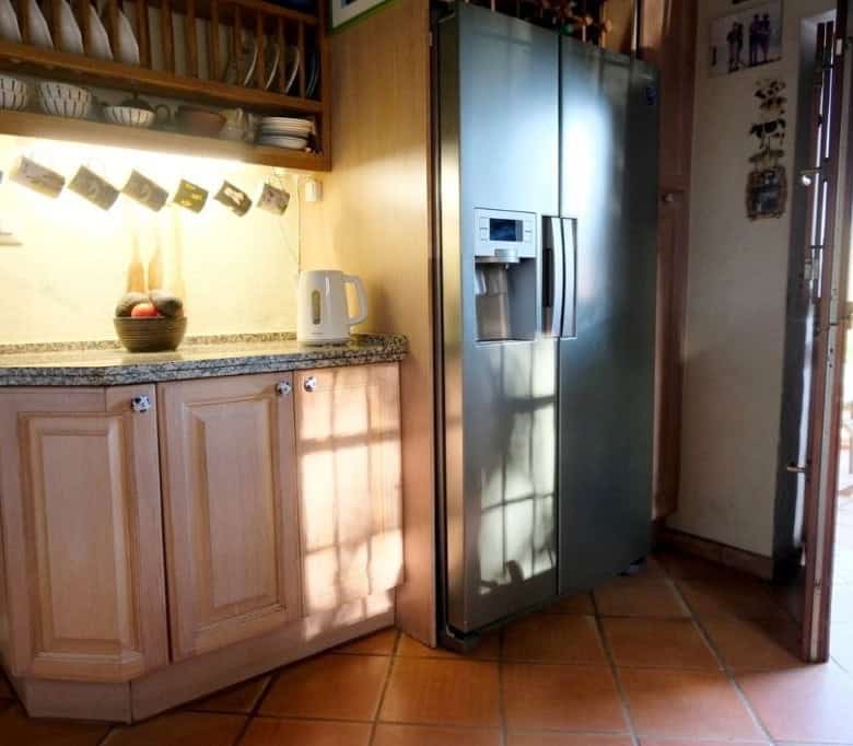 Elegant kitchen with modern appliances in La Casa de la Panzona finca, Estepona, Spain.