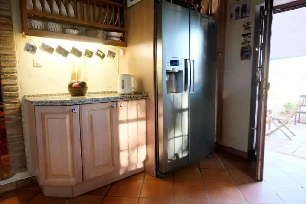 Elegant kitchen with modern appliances in La Casa de la Panzona finca, Estepona, Spain.