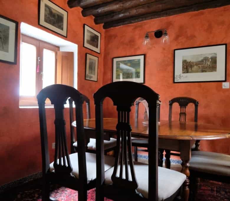 Cozy dining area in a traditional Spanish finca with wooden beams and rustic decor in Estepona, Spai.