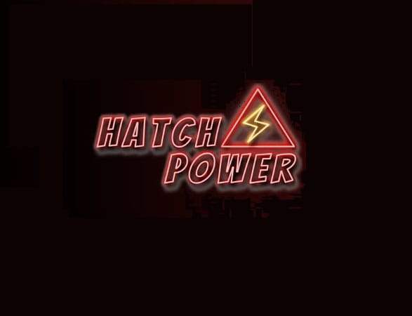 Neon sign reading "Hatch Power" with a lightning bolt symbol, glowing in red and yellow.