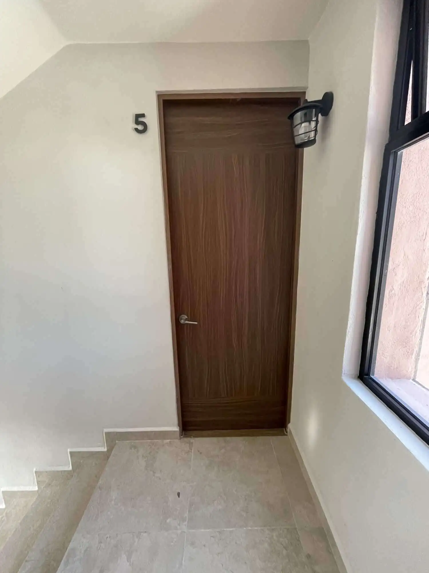Modern interior door in a stylish rooftop home in San Miguel de Allende.