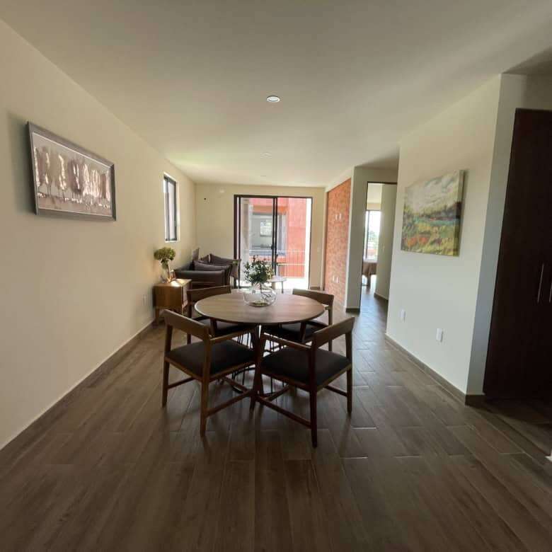 Spacious interior of a 2-bedroom rooftop home in San Miguel de Allende, featuring contemporary desig.