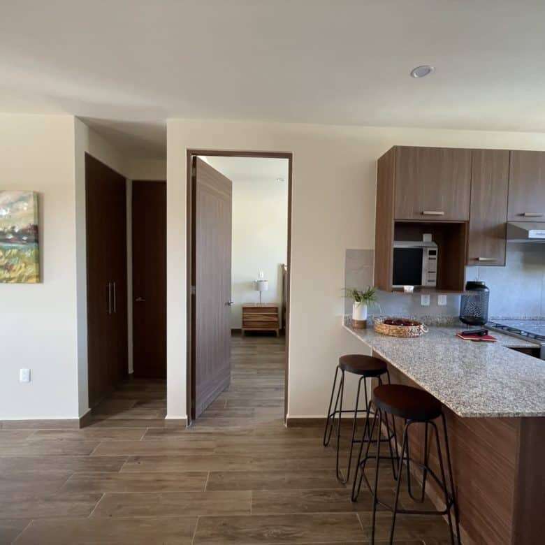 Bright and spacious kitchen with bar stools in San Miguel de Allende.