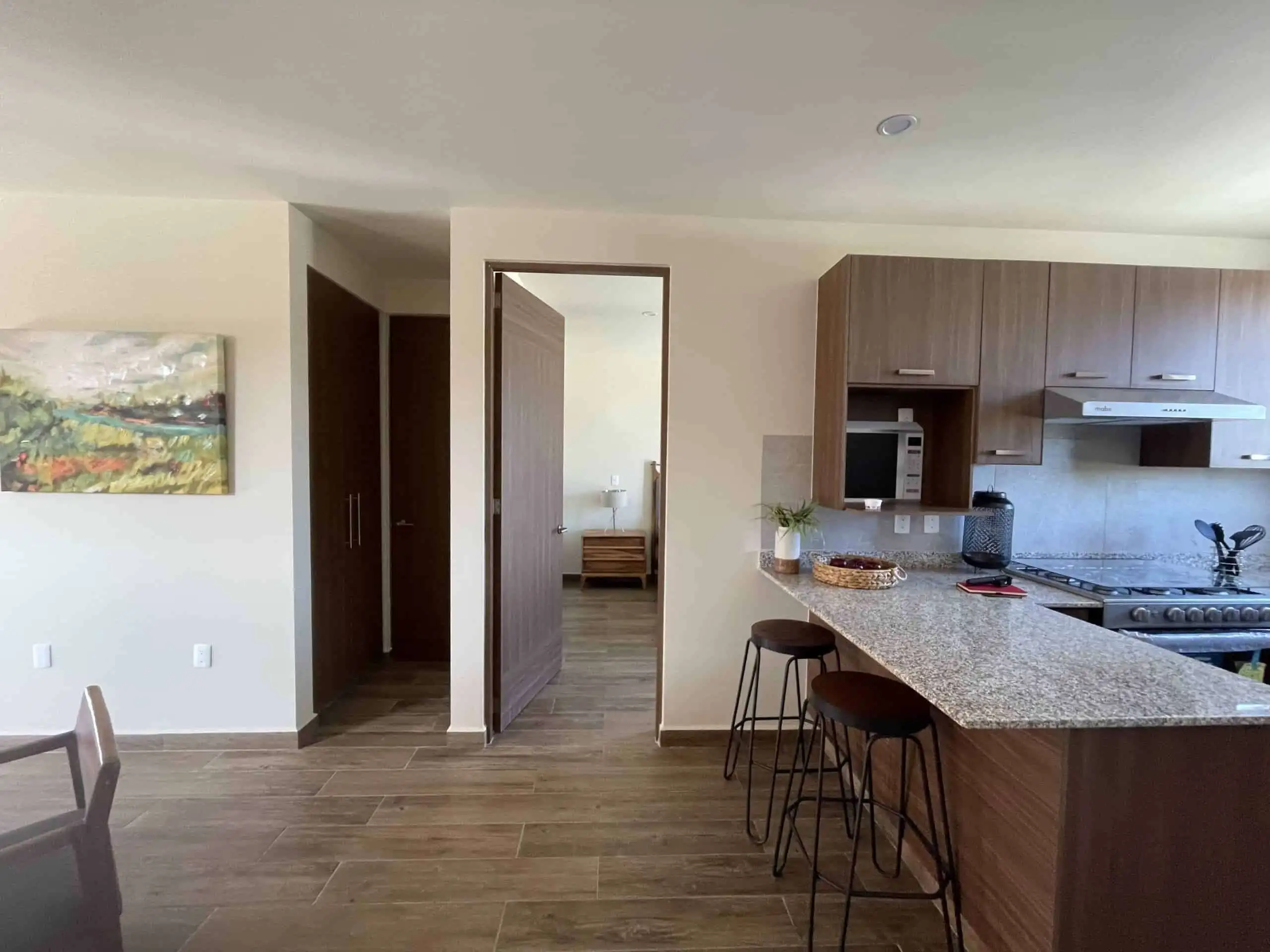 Bright and spacious kitchen with bar stools in San Miguel de Allende.