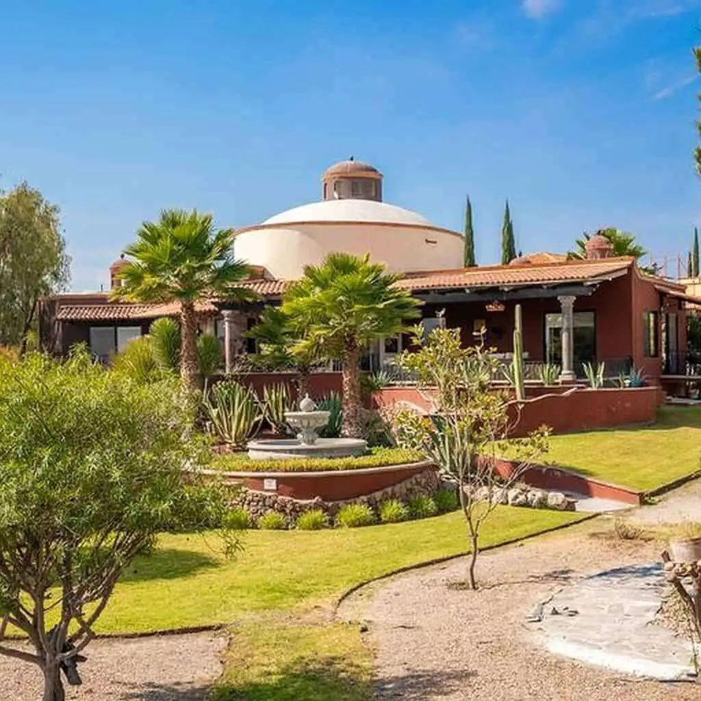 Style villa surrounded by lush gardens and a swimming pool. Perfect for a serene lifestyle and inves.