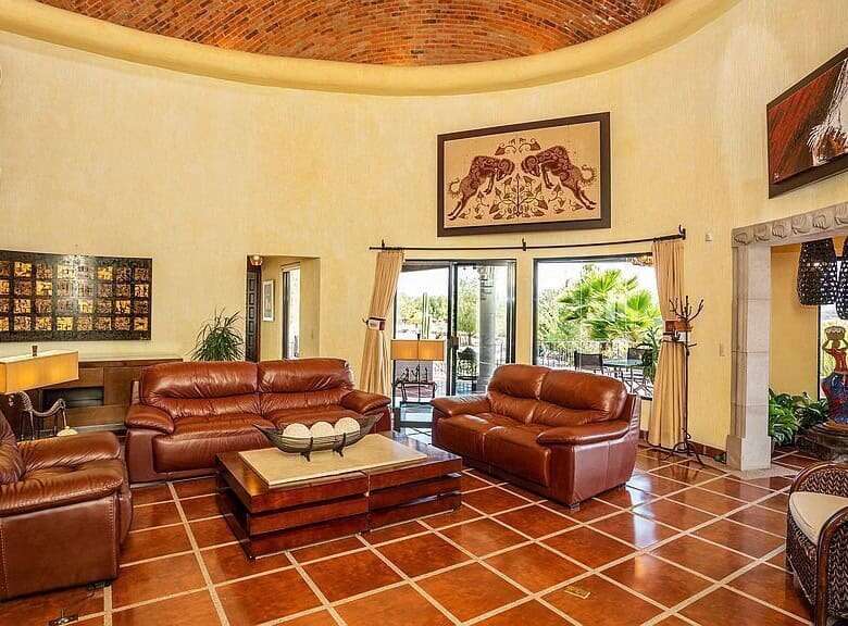 Elegant living room with comfortable leather sofas and stylish decor.